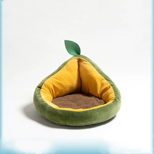 Avocado-shaped pet bed with yellow interior on a white background