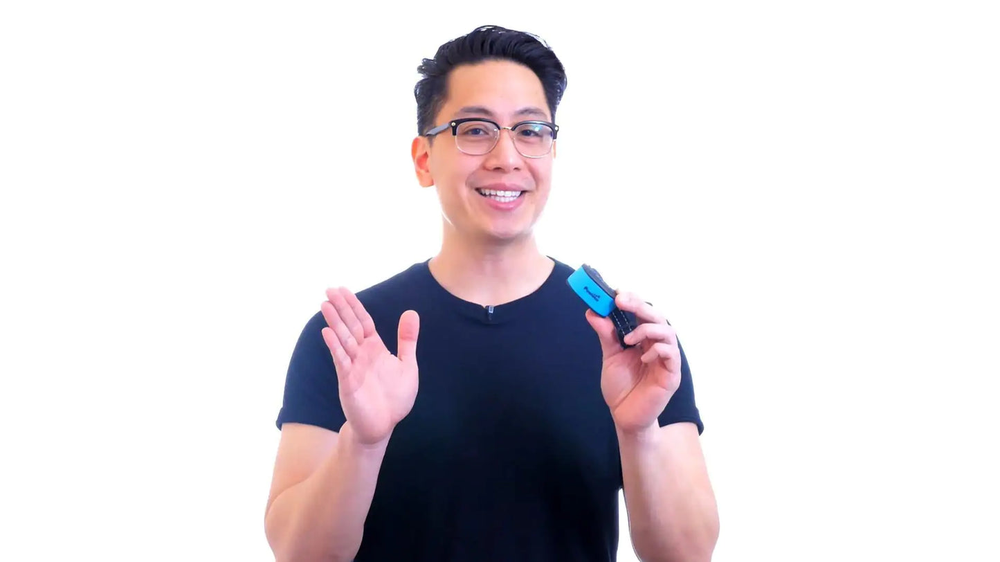 Man holding a blue object against a white background
