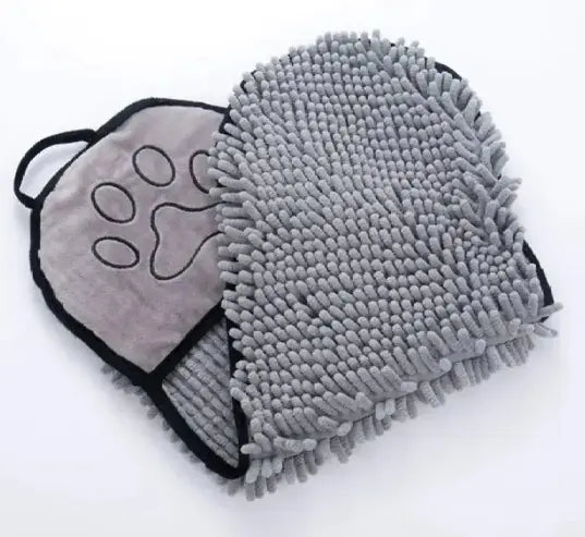 Gray chenille pet grooming mitt with paw design on a white background