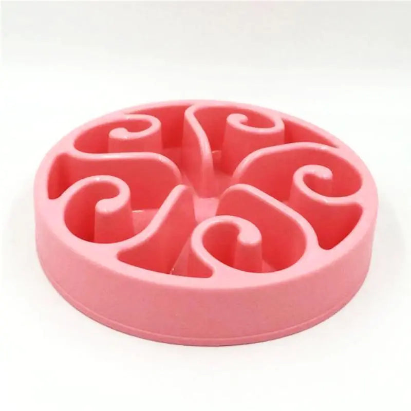 Pink silicone mold with wavy patterns on a white background