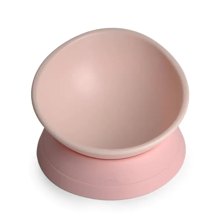 Pink silicone cup with a unique design on a white background