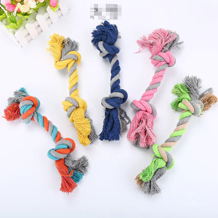 Colorful dog rope toys on a white background