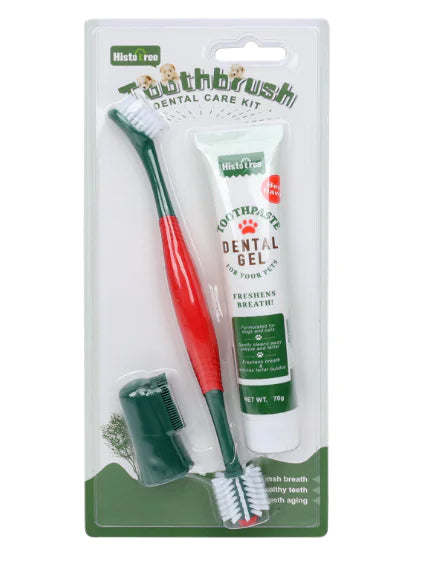 Dog toothbrush and dental care kit packaging with a red and green toothbrush, green gel tube, and small container on a white background.