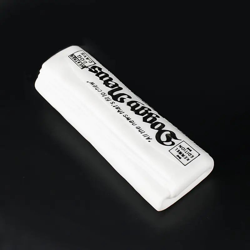 White eraser with black text on a dark background