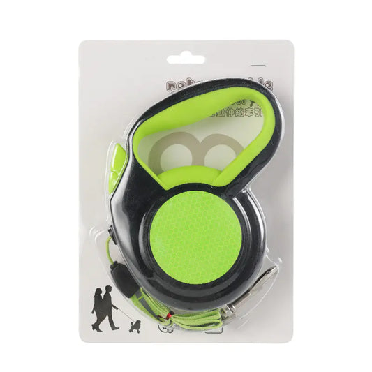 Green and black dog retractable leash in packaging on a white background