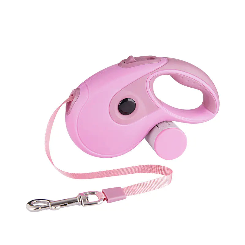 Pink retractable dog leash on a white background