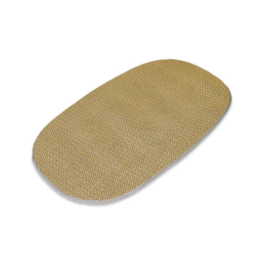 Beige oval-shaped mat on a white background