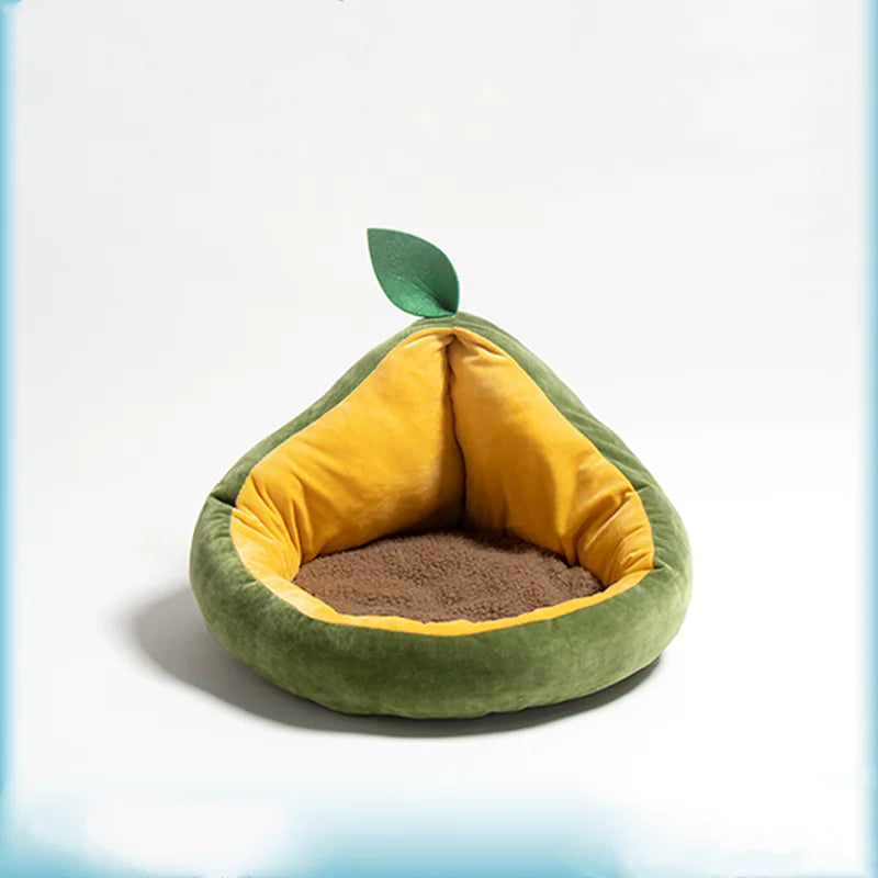 Avocado-shaped pet bed with yellow interior on a white background