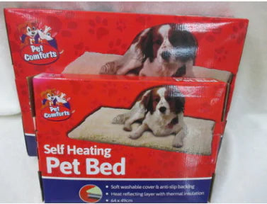 Two boxes of Pet Comforts self-heating pet bed on a white background