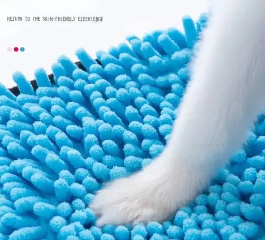 Blue textured mat with a white paw on it