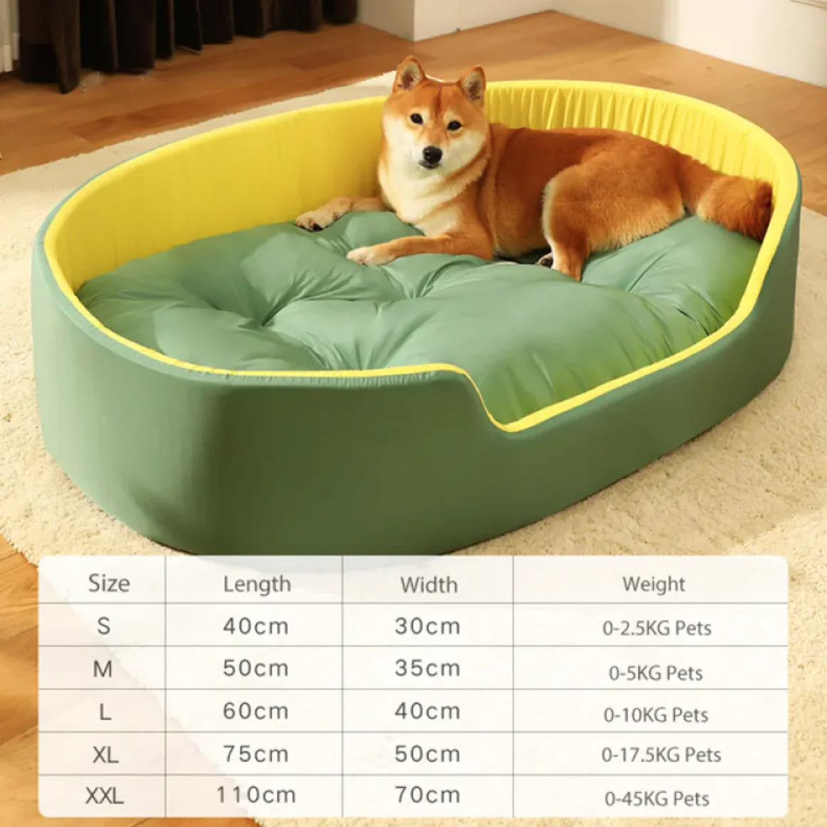 Dog lying on a green pet bed with yellow trim, surrounded by a size chart at the bottom.