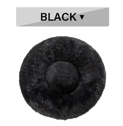 Black fluffy pet bed with a label indicating 'BLACK' on a white background