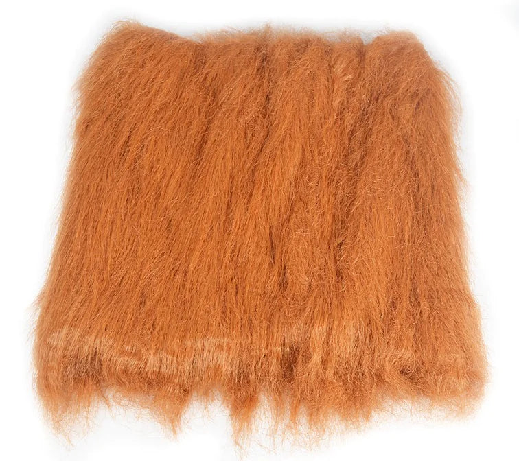 Brown fuzzy pillow on a white background