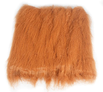 Brown fuzzy pillow on a white background