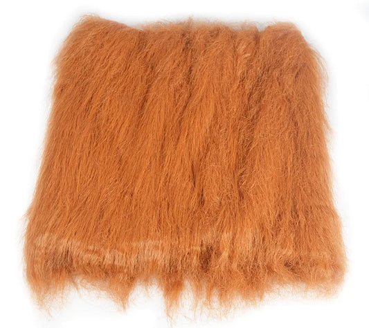 Brown fuzzy pillow on a white background