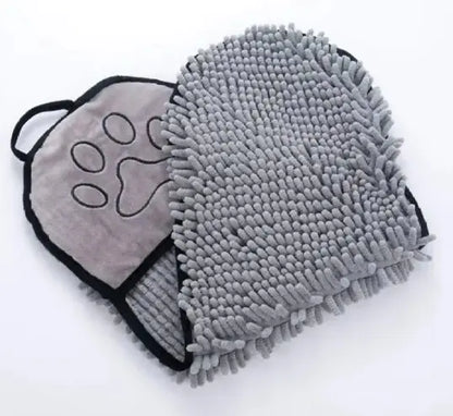 Gray chenille pet grooming mitt with paw design on a white background