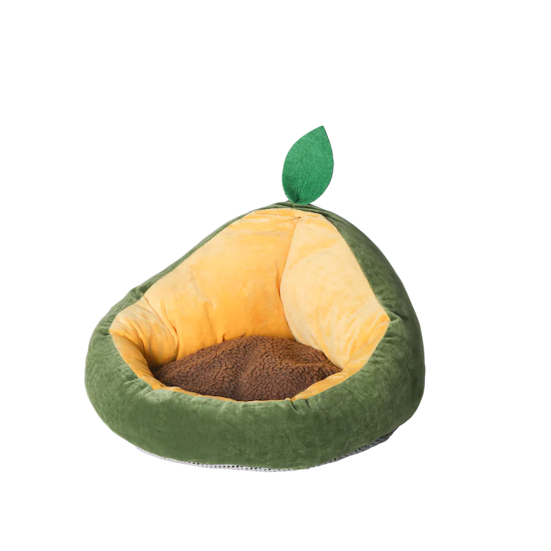 Avocado-shaped pet bed with a leaf on a white background