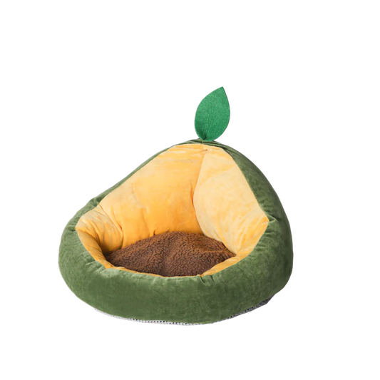 Avocado-shaped pet bed with a leaf on a white background
