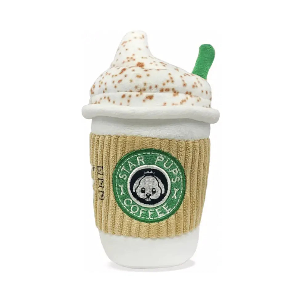 Toy resembling a coffee cup with a knit sleeve and whipped cream on a white background