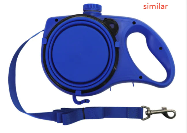 Blue retractable dog leash with handle on a white background