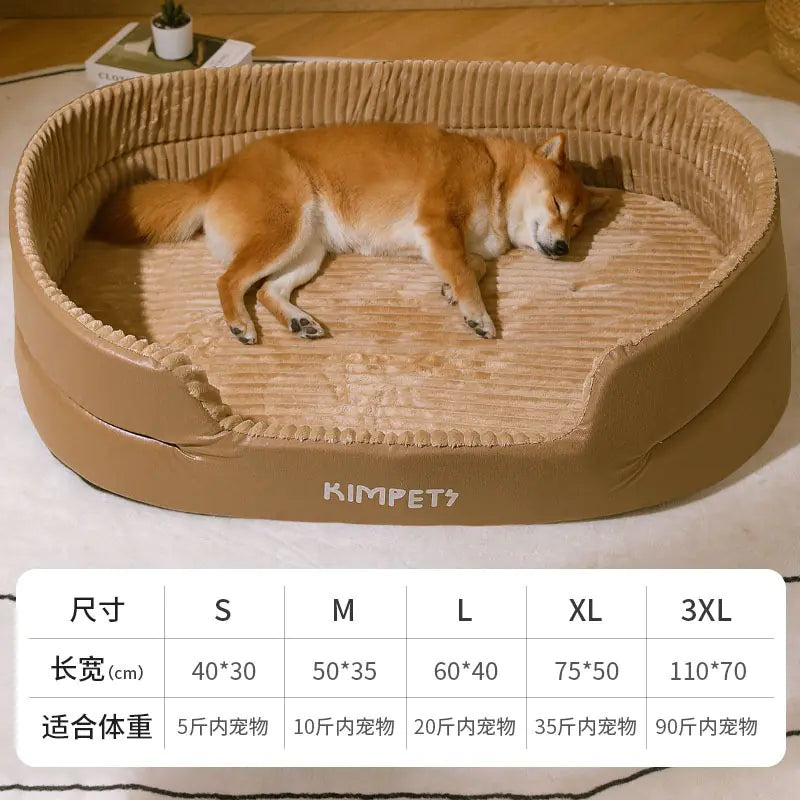 Dog lying on a brown pet bed with KIMPET branding, on a light wooden floor.