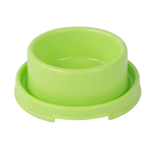 Green plastic bowl on a white background