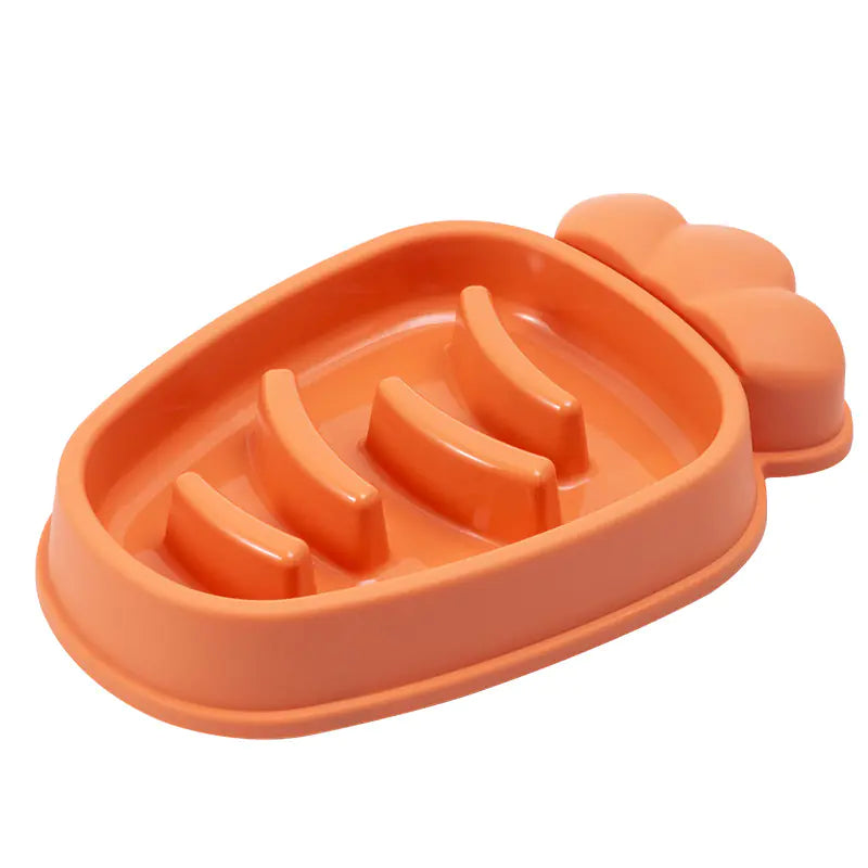 Orange pet food dish with banana-shaped compartments on a white background
