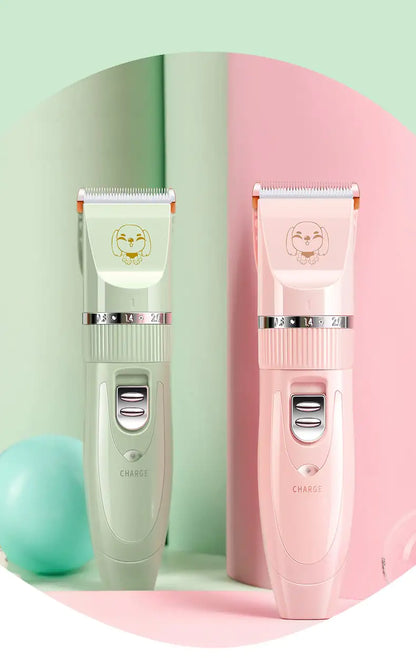 Two pet grooming clippers, one green and one pink, on a pastel background.