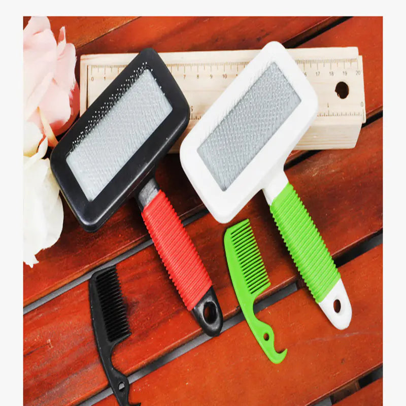 Set of pet grooming tools including brushes and combs on a wooden surface.