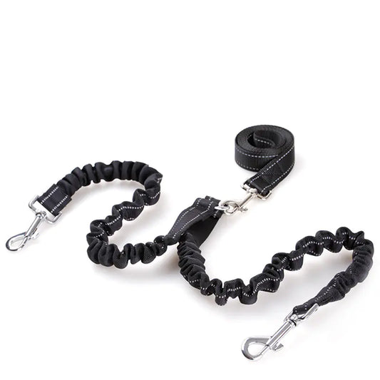 Black dog leash with handle and reflective strip on a white background