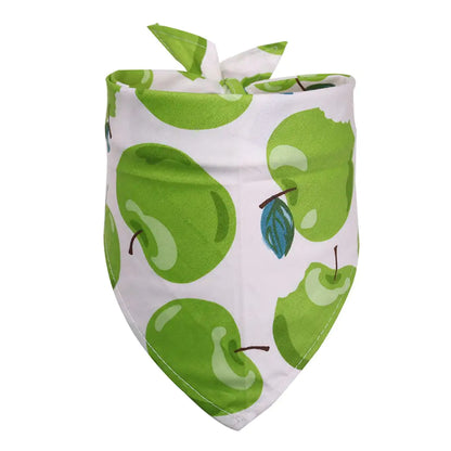 Baby bib with green apple pattern on a white background