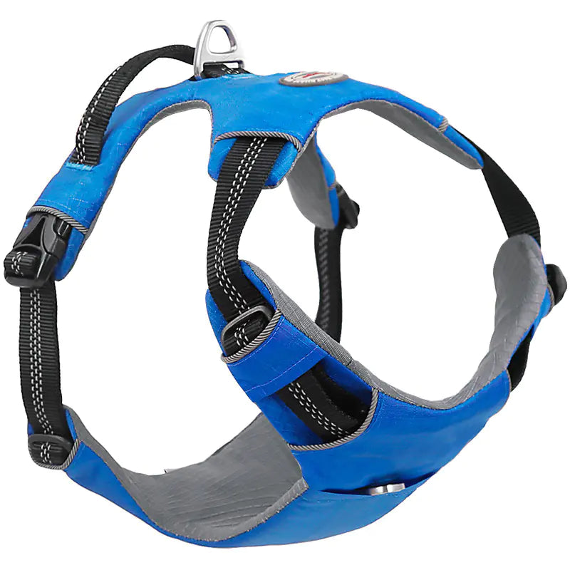 Blue and gray dog harness on a white background