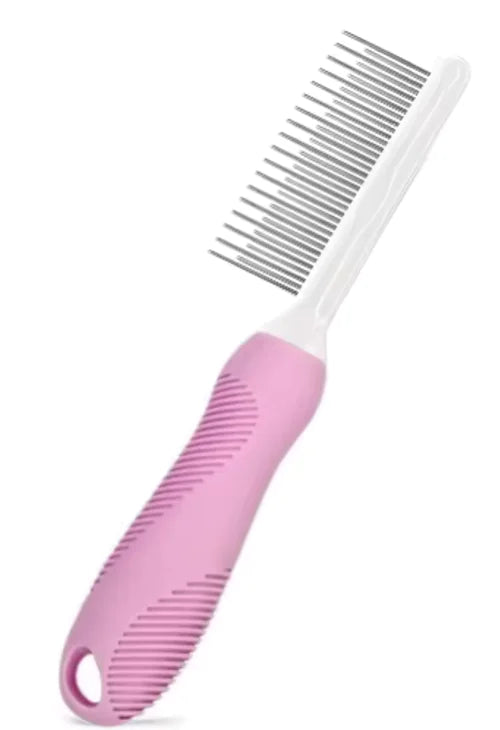 Pink pet comb with white handle on a white background