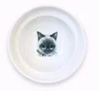 White ceramic bowl with a cat design on a white background