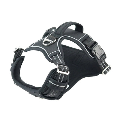 Black dog harness with reflective stripes on a white background