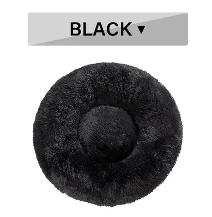 Black fluffy pet bed with a label indicating 'BLACK' on a white background