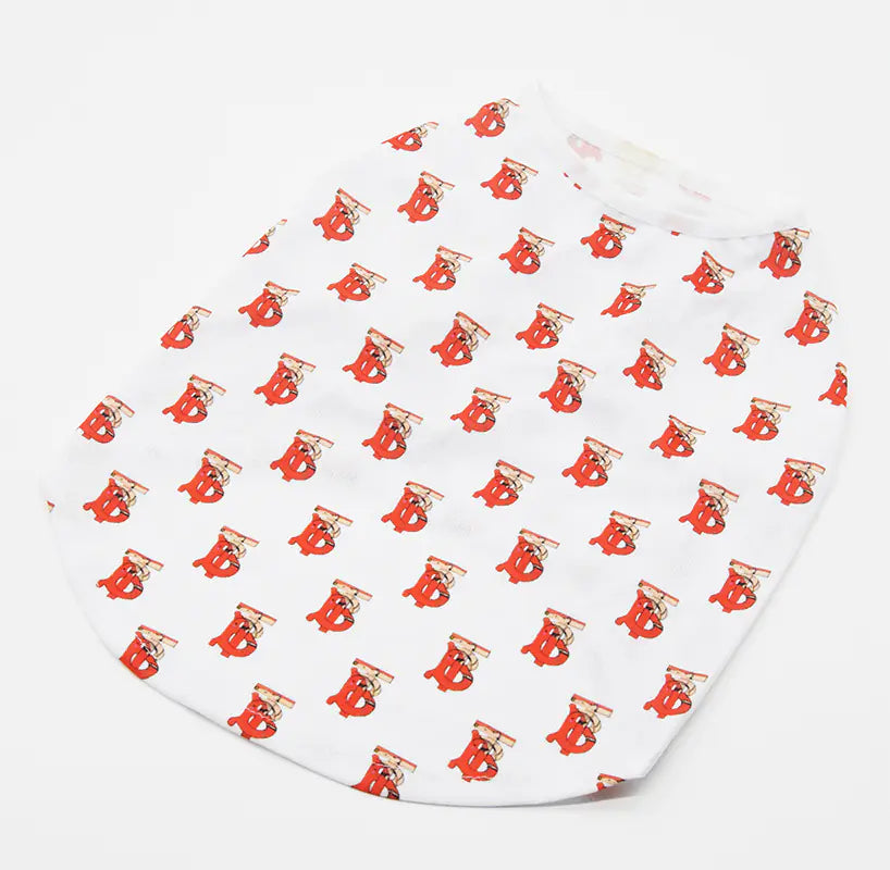 Baby blanket with red and gold bear pattern on a white background