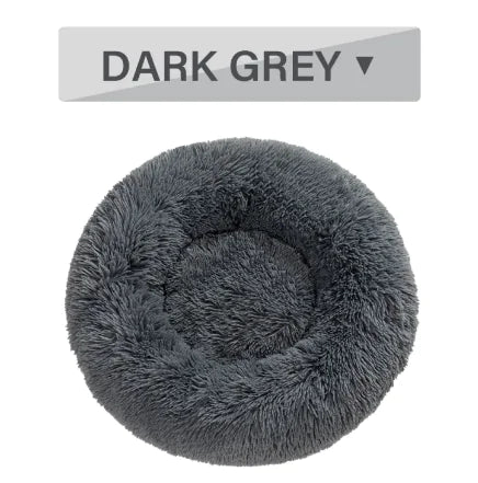 Dark grey fluffy pet bed with a label indicating color option on a white background