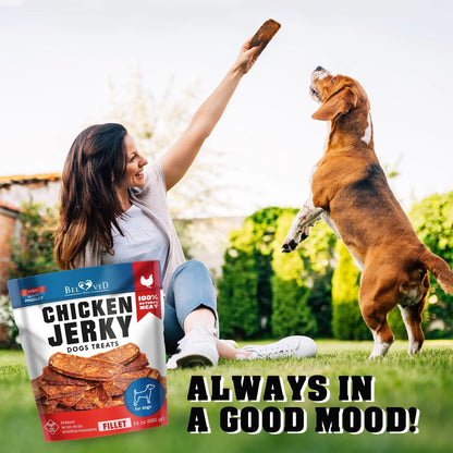 Woman and dog playing with a bag of Bixbi Chicken Jerky Dog Treats in a backyard setting.